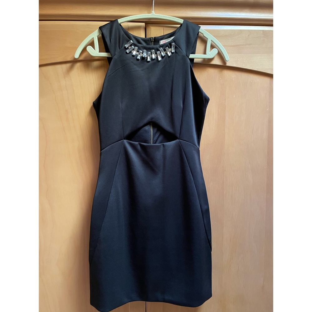 black cutout dress with embellished neckline